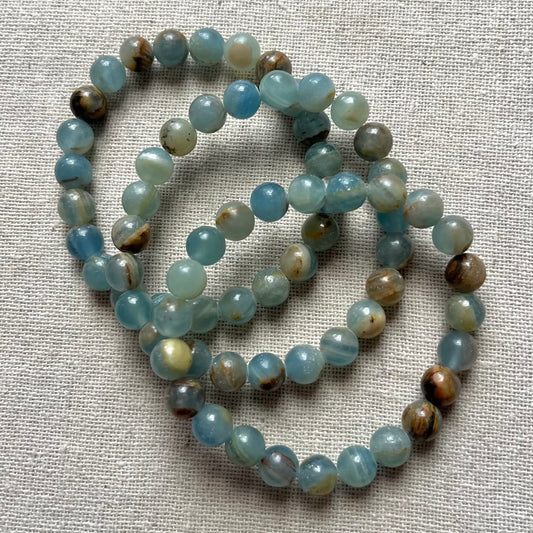Lemurian Calcite 8mm Beaded Bracelet - Clarity