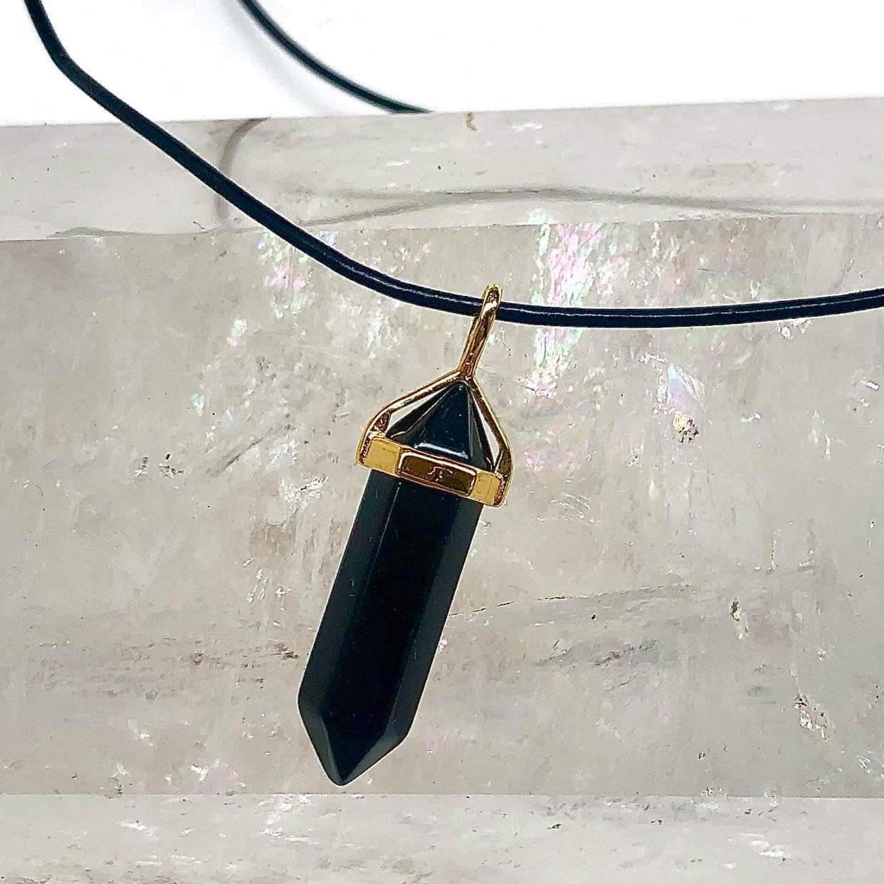 Onyx Point Pendant - Lithos Crystals