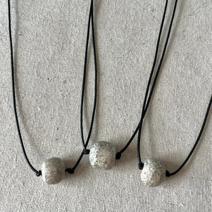 Mastodon Fossil Stone Pendant - Ancient Wisdom