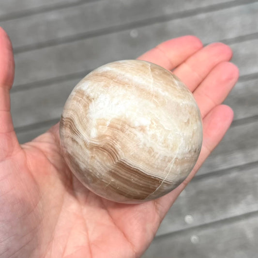 Amber Calcite Medium Sphere Crystal - Warm, Uplifting, Calming