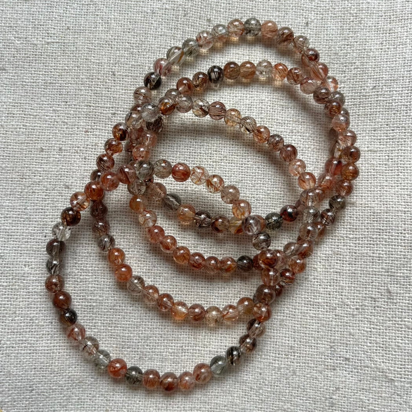 Black Gold Super Seven Quartz 4mm Beaded Bracelet - Resilliance