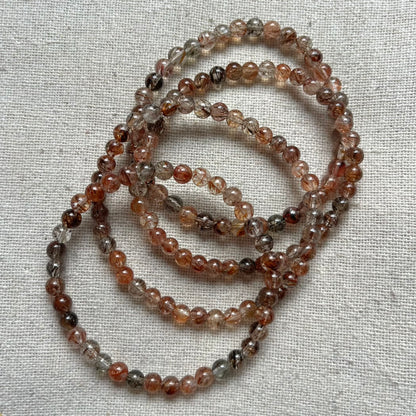 Black Gold Super Seven Quartz 4mm Beaded Bracelet - Resilliance
