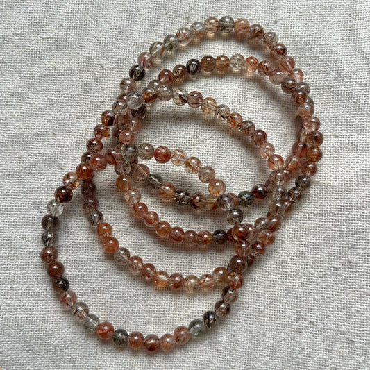 Black Gold Super Seven Quartz 4mm Beaded Bracelet - Resilliance