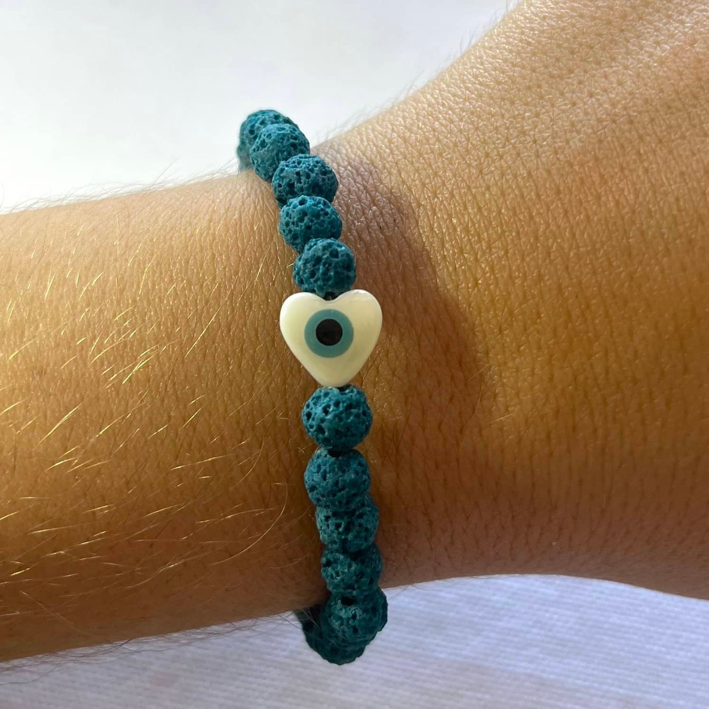 Blue Lava Stone Evil Eye Heart Bracelet - Lithos Crystals