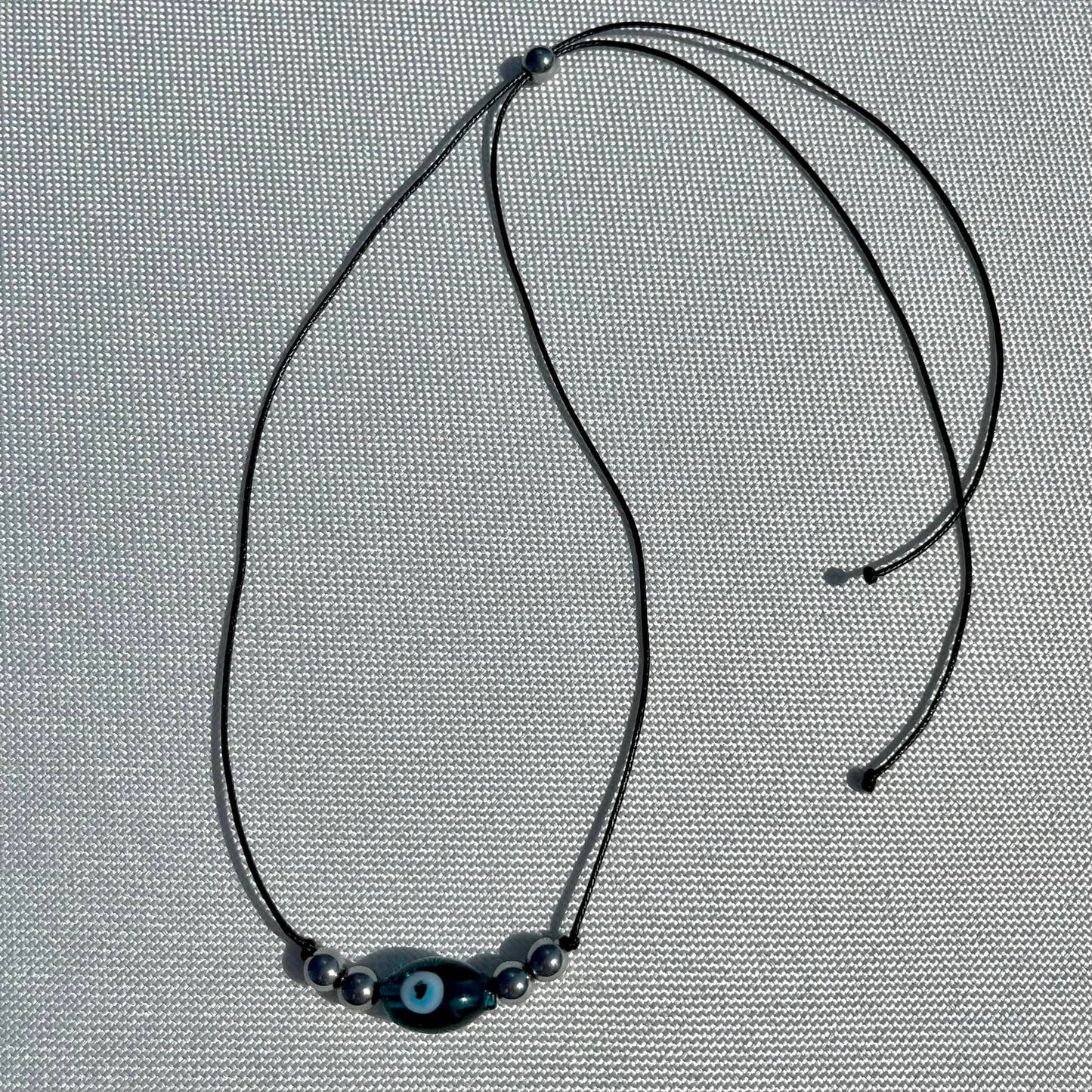 Evil Eye Hematite Necklace - Lithos Crystals