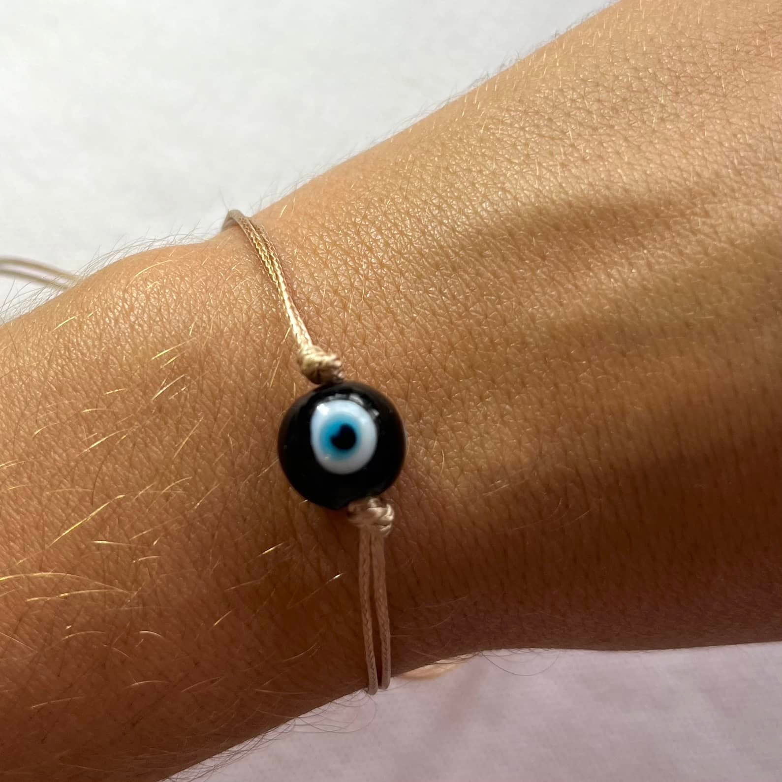 Evil Eye Tan Cord Bracelet - Lithos Crystals