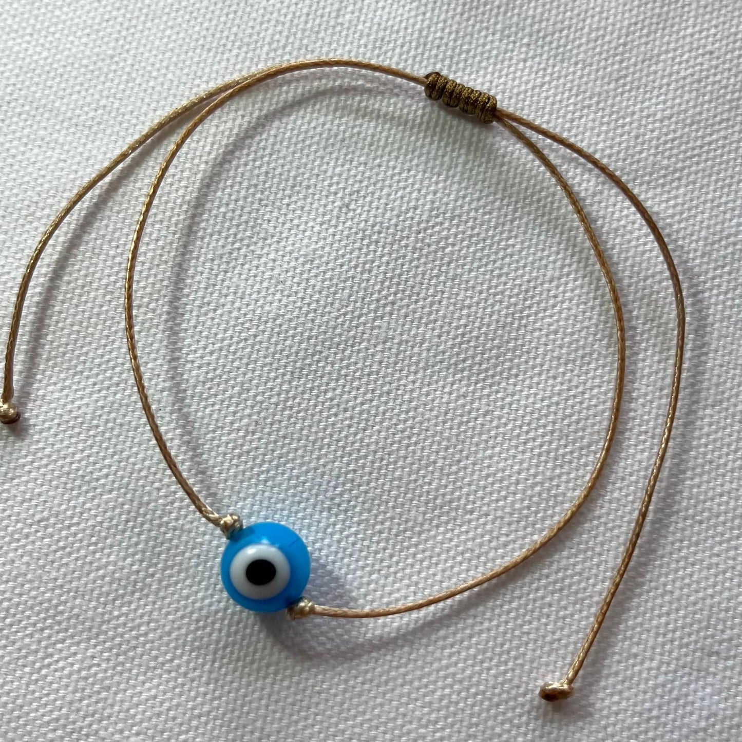Evil Eye Tan Cord Bracelet - Lithos Crystals